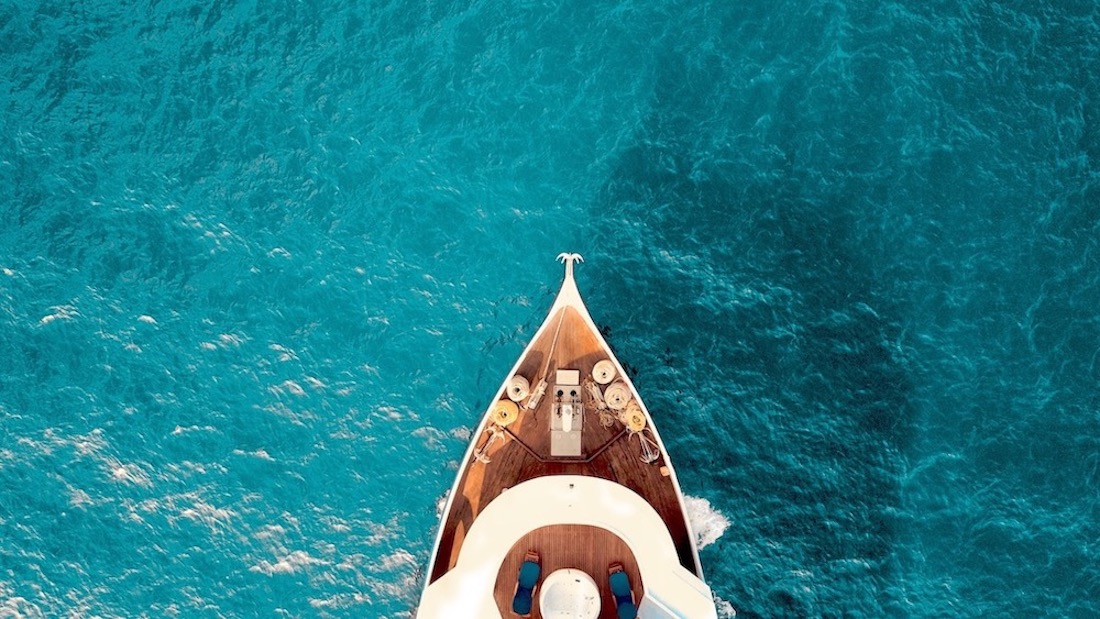 There's nothing better than unwinding on a luxury cruise. Small luxury cruise ship in cool blue water