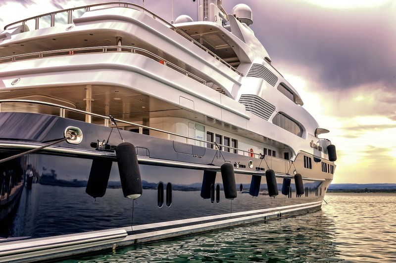 Elevate your cruise experience on a luxury yacht Luxury yacht on the ocean at sunset